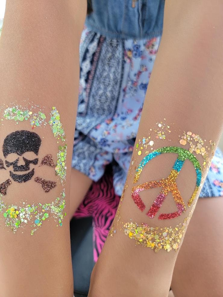 Skull and peace sign glitter tattoos